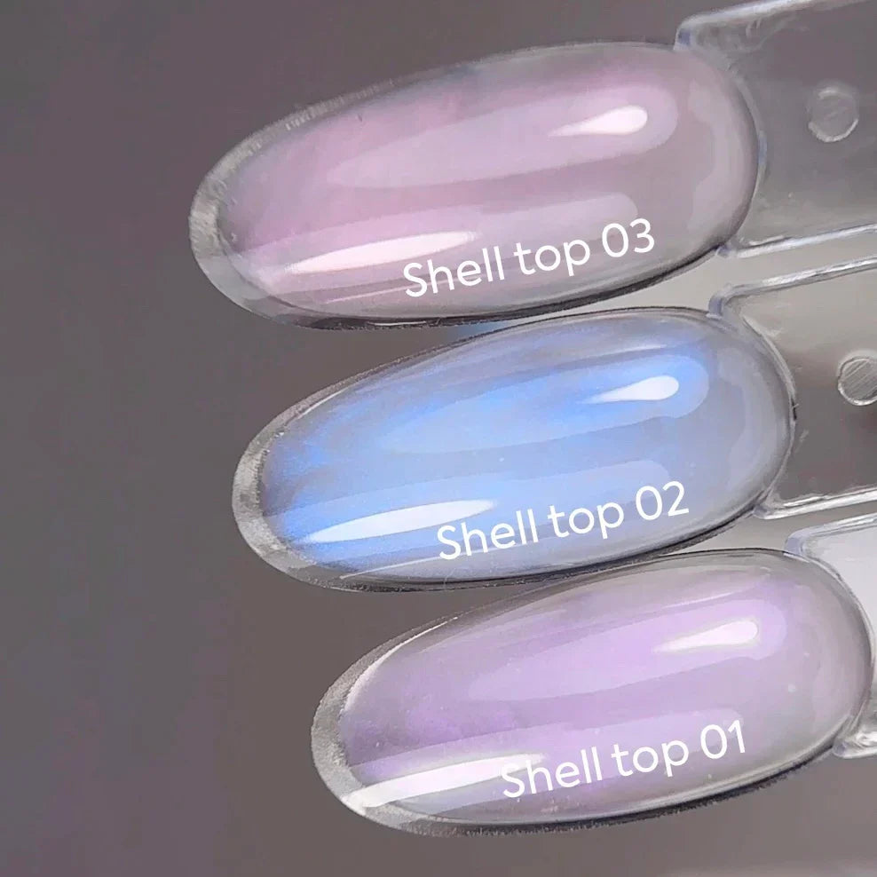 NAILSOFTHEDAY Shell Top 02 Nueva Fórmula — top perlado con efecto de frotado azul, sin capa pegajosa, 10 ml
