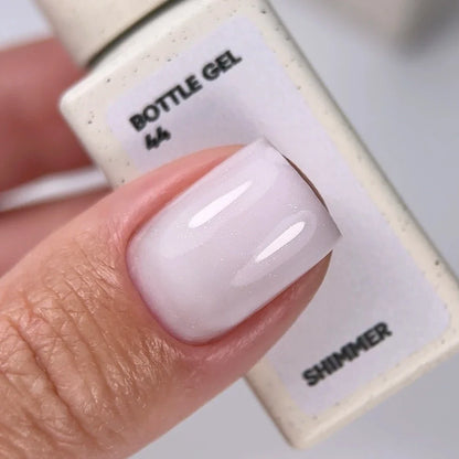 NAILSOFTHEDAY Bottle Gel 44 Shimmer — gel ultrarresistente blanco con shimmer plateado para reforzar las uñas, 10 ml