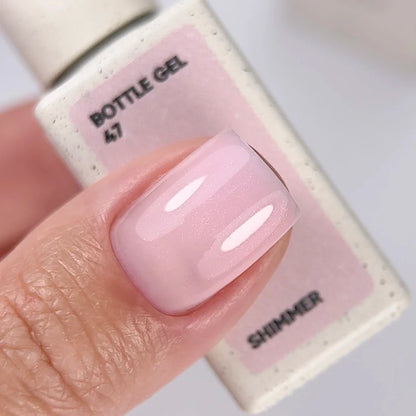 NAILSOFTHEDAY Bottle Gel 47 Shimmer — gel ultrarresistente rosa lechoso con shimmer rosa para reforzar las uñas, 10 ml