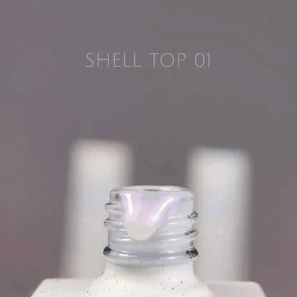 NAILSOFTHEDAY Shell Top 01 Nueva Fórmula — top perlado con efecto de frotado violeta, sin capa pegajosa, 10 ml