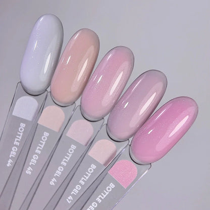 NAILSOFTHEDAY Bottle Gel 46 Shimmer — gel ultrarresistente rosa lechoso con shimmer plateado para reforzar las uñas, 10 ml