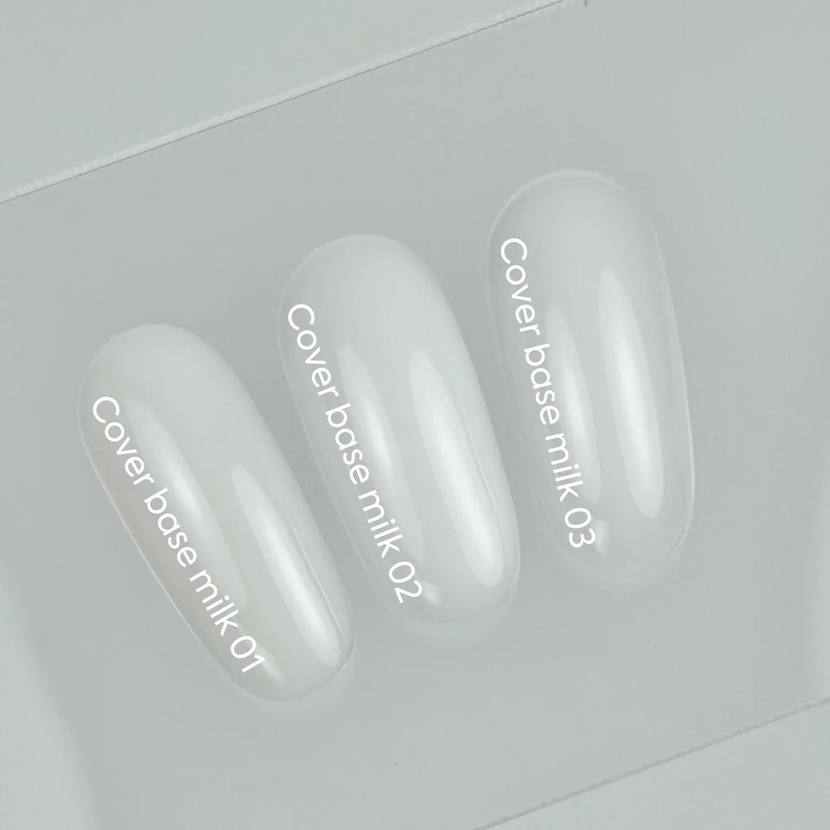 Nailsoftheday Cover Base NEW Formula Milk 01 - base camuflaje semitransparente de tono frío lechoso, 10 ml.