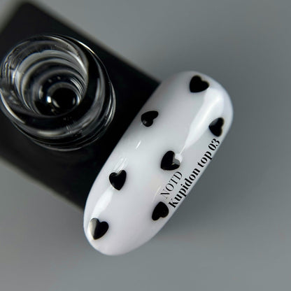 NAILSOFTHEDAY Kupidon top 03: top delicado para uñas con corazones negros intensos, sin capa pegajosa, 10 ml