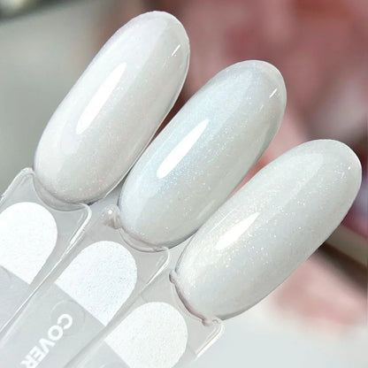 Nailsoftheday Cover base NEW Formula milk 06 — un tono lechoso, semitransparente con brillo azul que crea un efecto de tono más frío, una base de camuflaje para uñas, 10 ml.